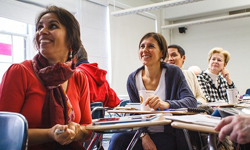 photo of a group of people in a classroom setting